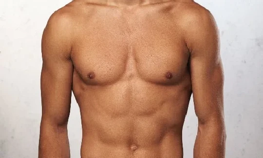 What causes puffy nipples in men?